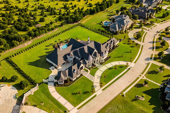 expertly landscaping circular driveway